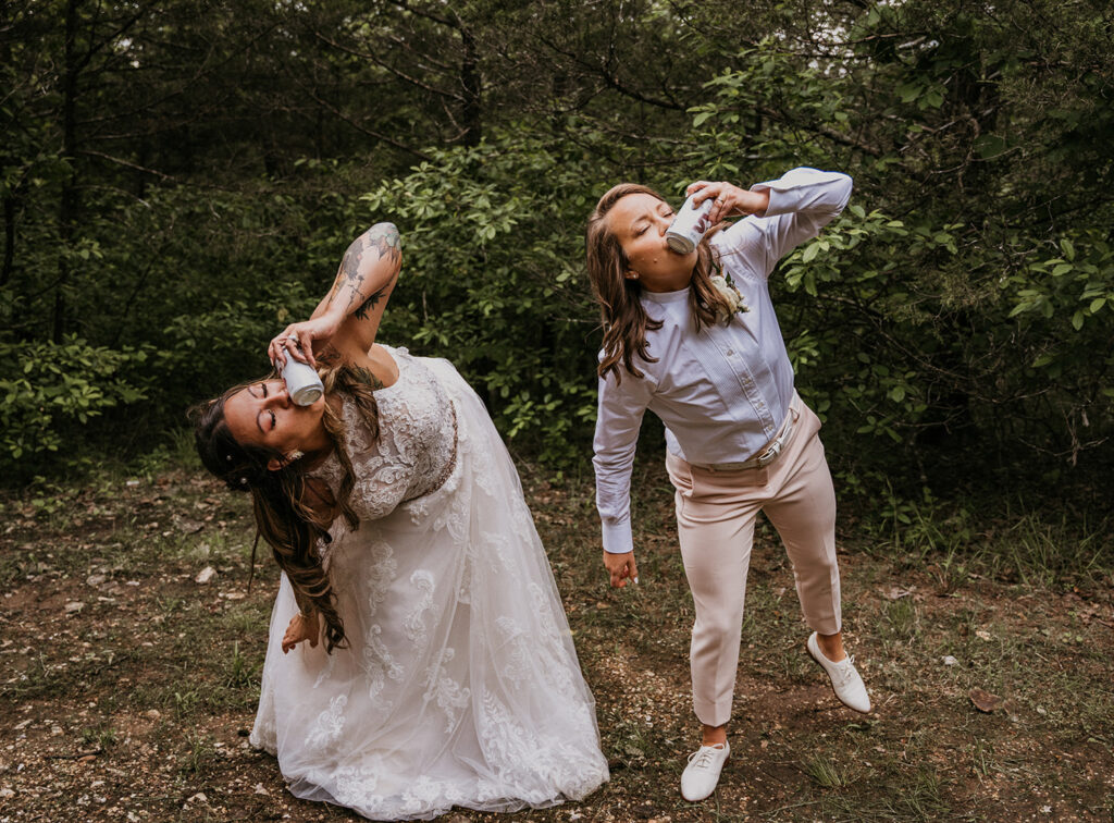 A couple is shotgunning beers after their elopement in Arkansas.