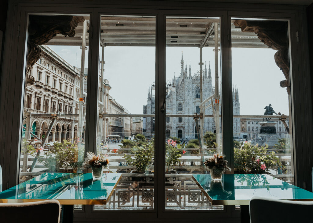 Duomo di Milano view from bakery/coffee shop in Milan, Italy. 

